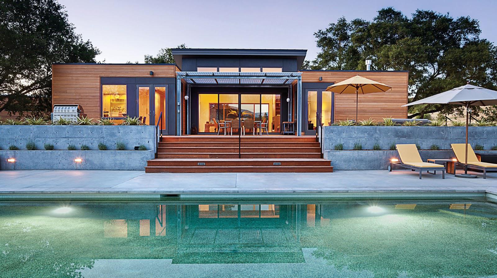 casa in legno con piscina a sfioro