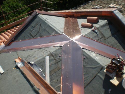 tetto con scarico in rame