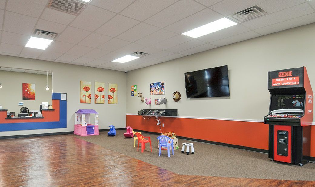 Dental Zone-Cleburne-Texas Front desk and kid's play area.