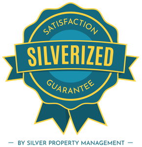 Teal and gold “Silverized” satisfaction guarantee seal by Silver Property Management