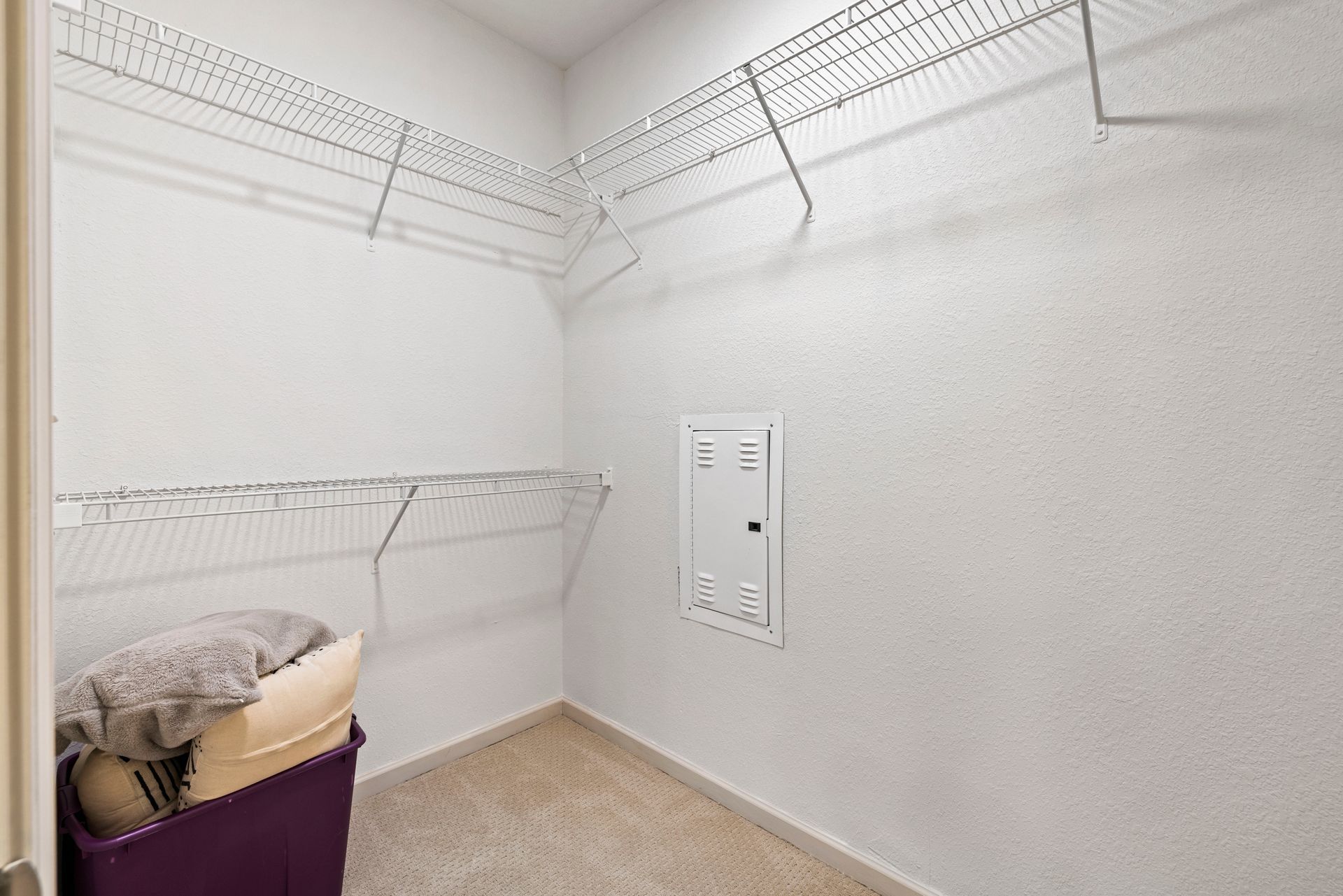 Walk-in closet at Silver Collection at Waterford in Huntersville, NC.