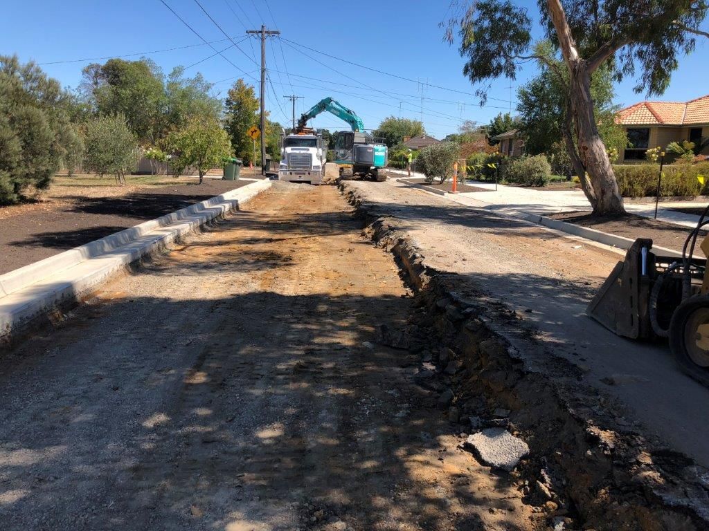 Backhoe Loading Soil on Dump Truck — Ballarat VIC — Ballarat Excavation & Transport