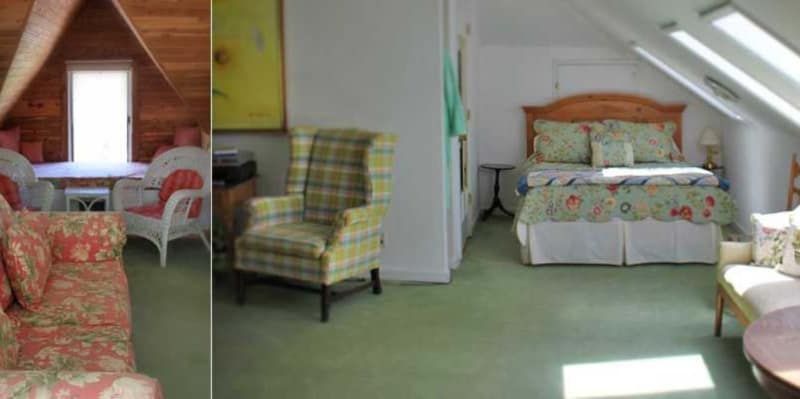 A bedroom with a couch , chair , table and bed.