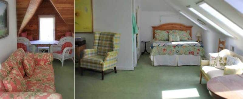 A bedroom with a couch , chair , table and bed.