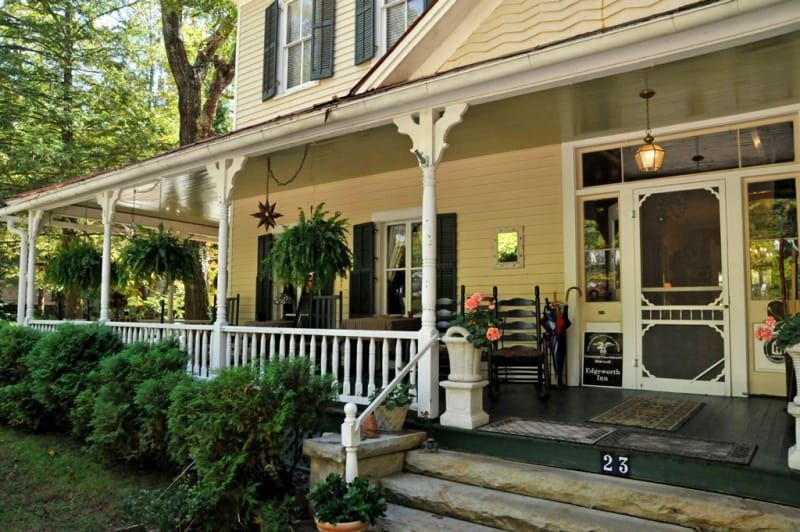 A house with a porch and a screen door