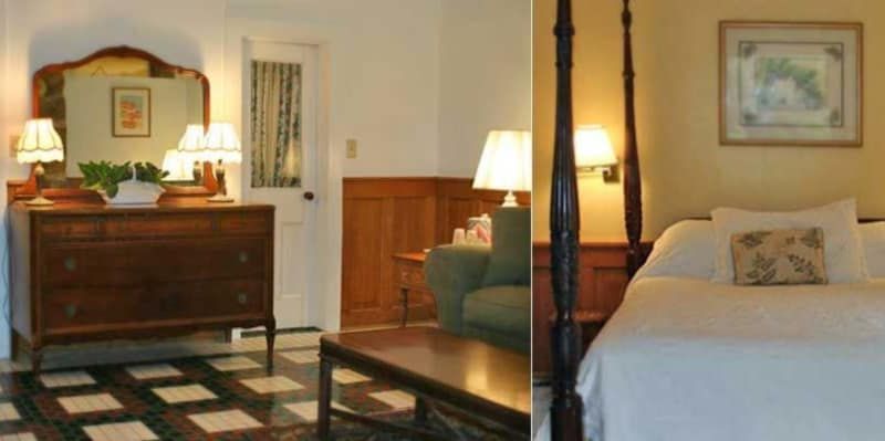 A bedroom with a four poster bed and a dresser