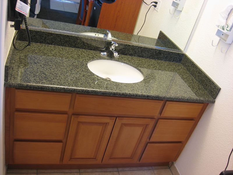 Motel Bathroom Counter top and Cabinets
