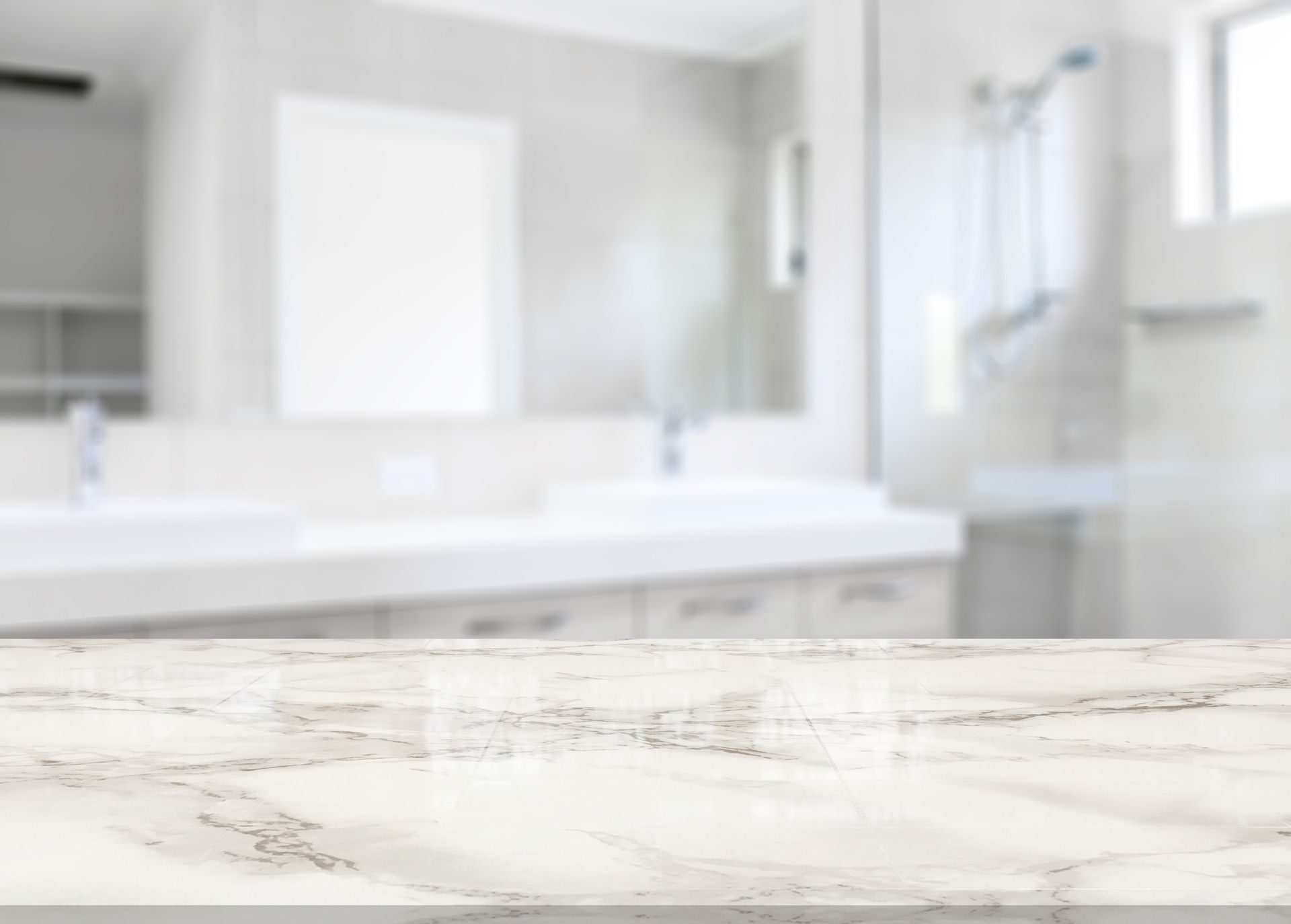 There is a marble counter top in the foreground and a bathroom in the background.