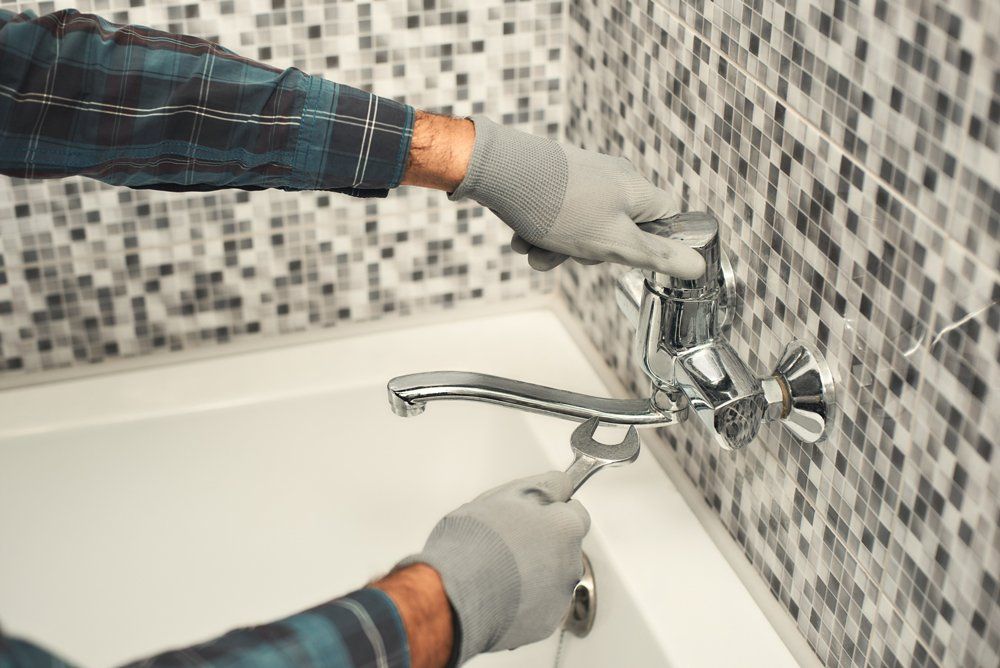 Bathroom Faucet Repair — Urbana, IL — Urbana Plumbing & Heating Inc