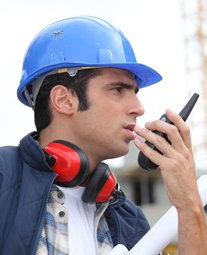 construction worker on walkies talkie