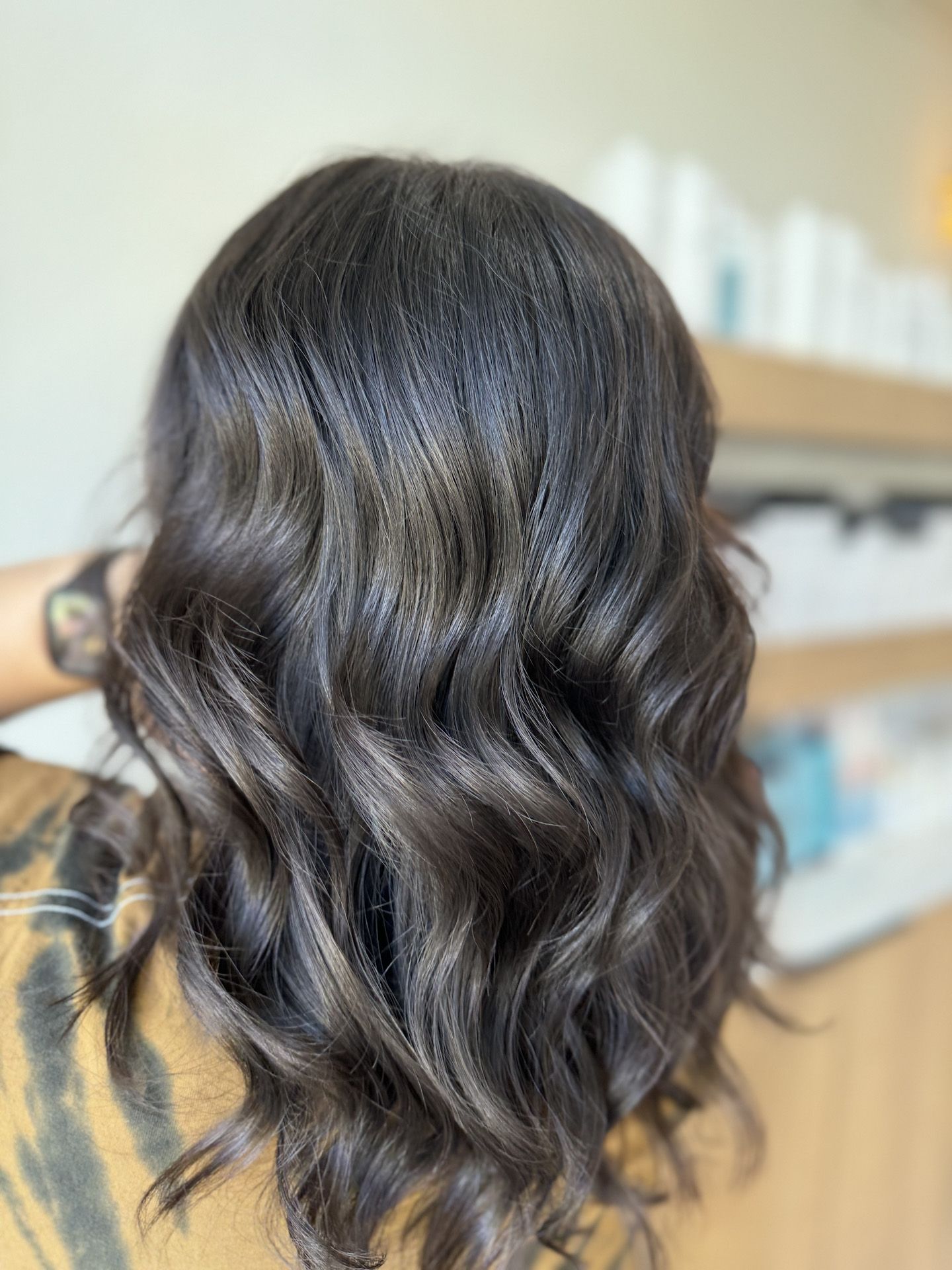 A close up of a woman 's hair in a salon.
