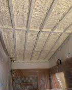 A room with a ceiling that is covered in foam.