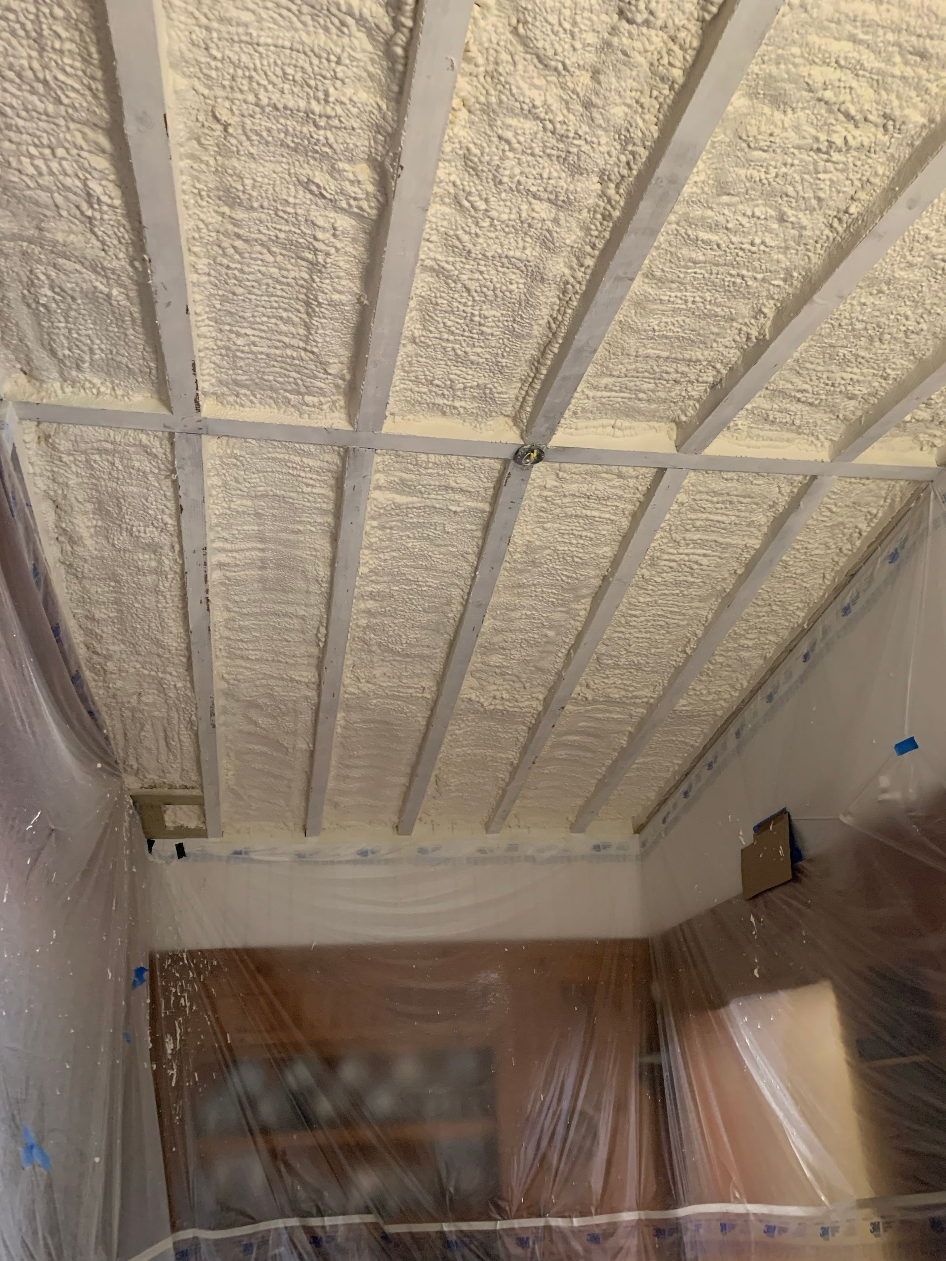 A room with a ceiling that is covered in foam.