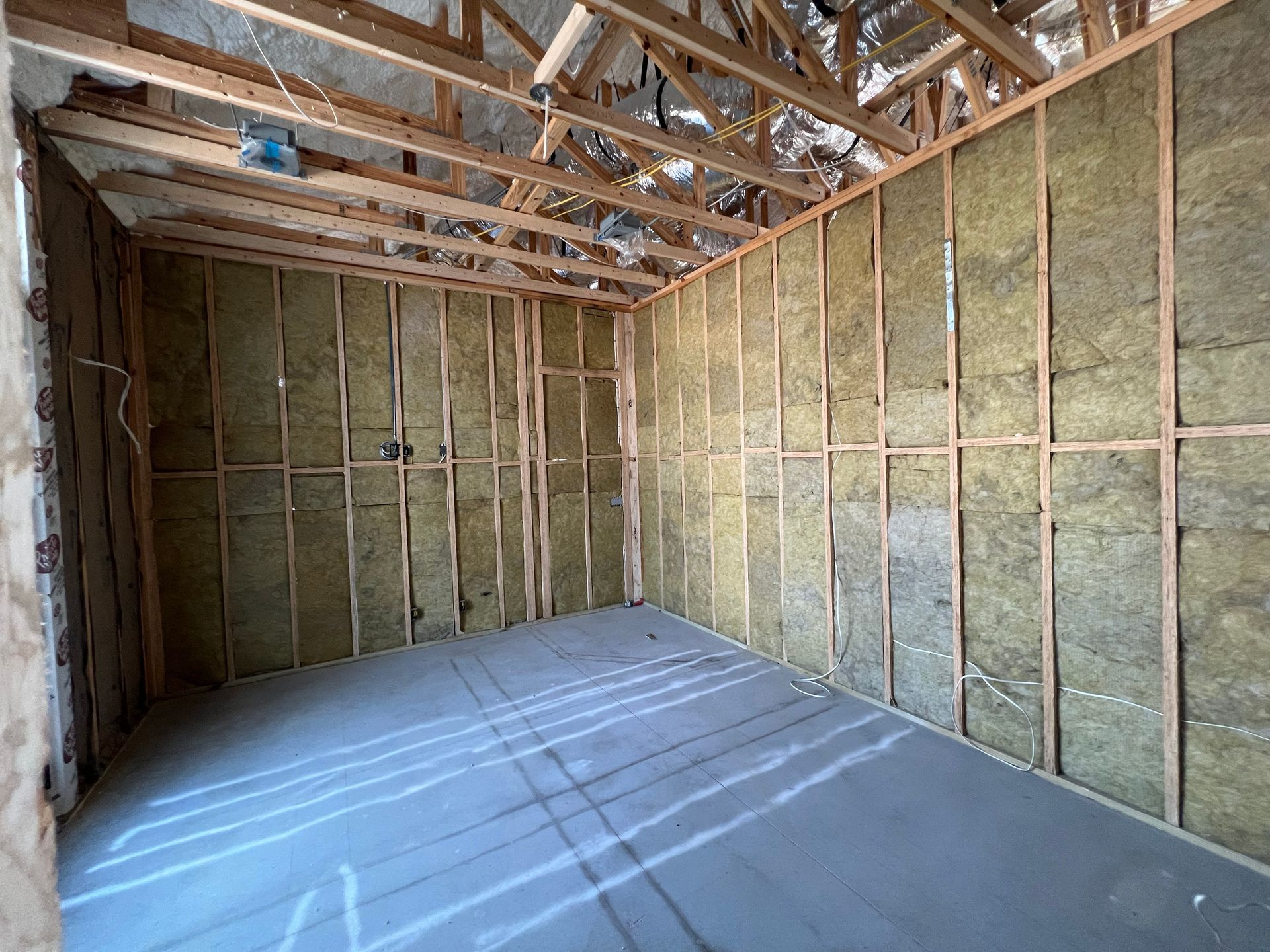 A room with a lot of insulation on the walls and ceiling.