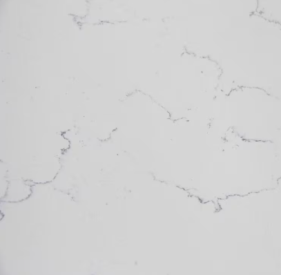 Carrera White Quarts counter top with subtle gray veining installed by Stoneking Granite.