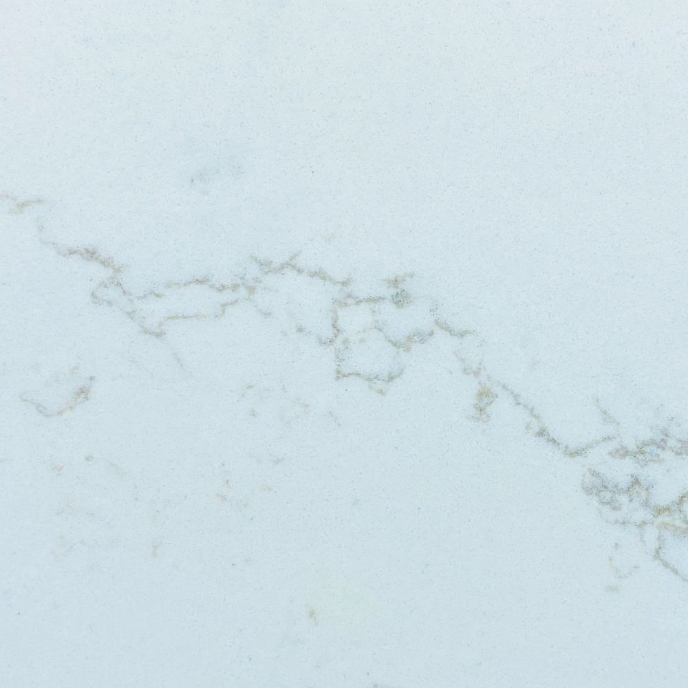 Carrera Gold Quartz counter tops with gray veining installed by Stoneking Granite in Lubbock, Texas. 