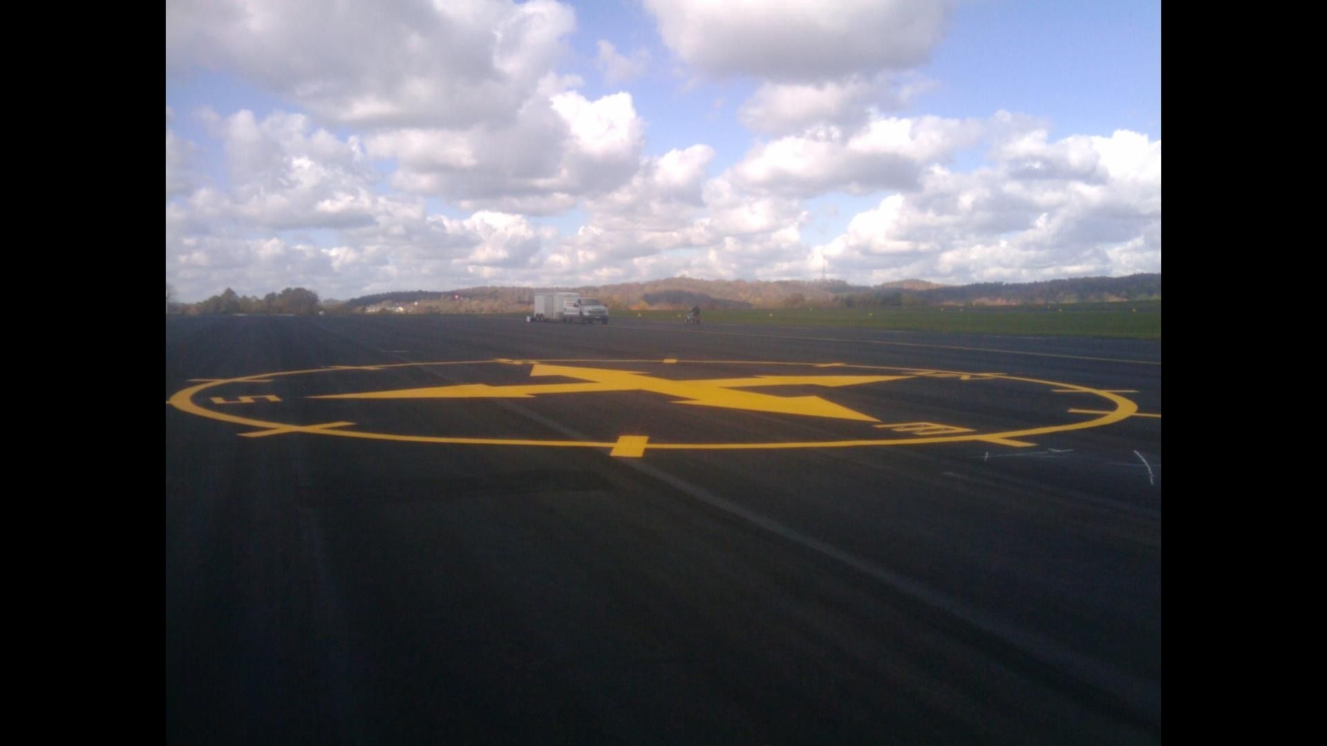 A large yellow circle with the letter x on it