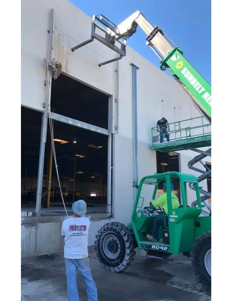 A man standing in front of a green sunset aerial lift