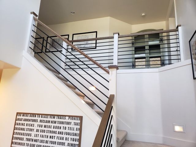 a staircase with a sign that says 