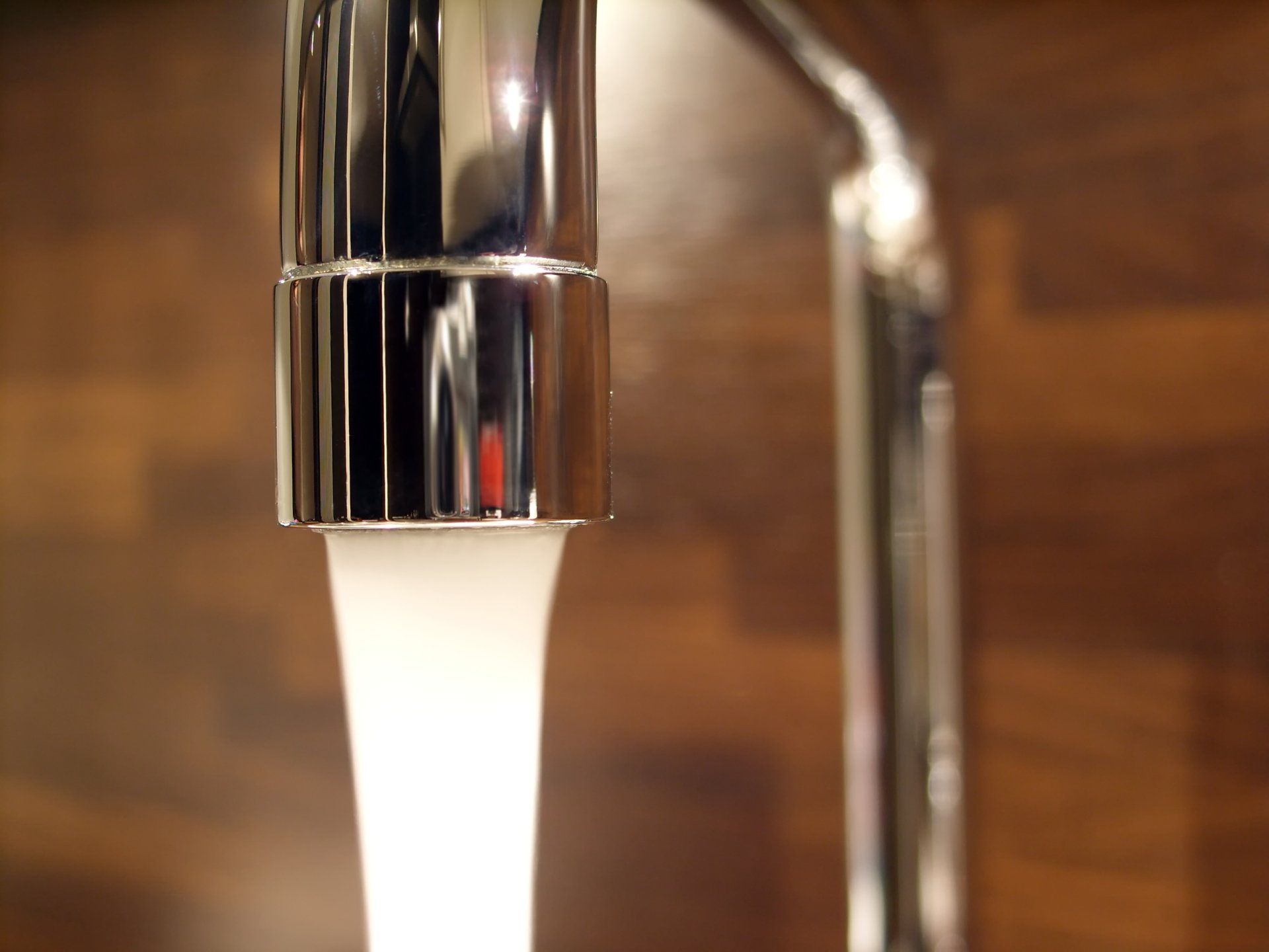 Faucet With Running Water — El Paso, TX — Sunrise Plumbing Co.