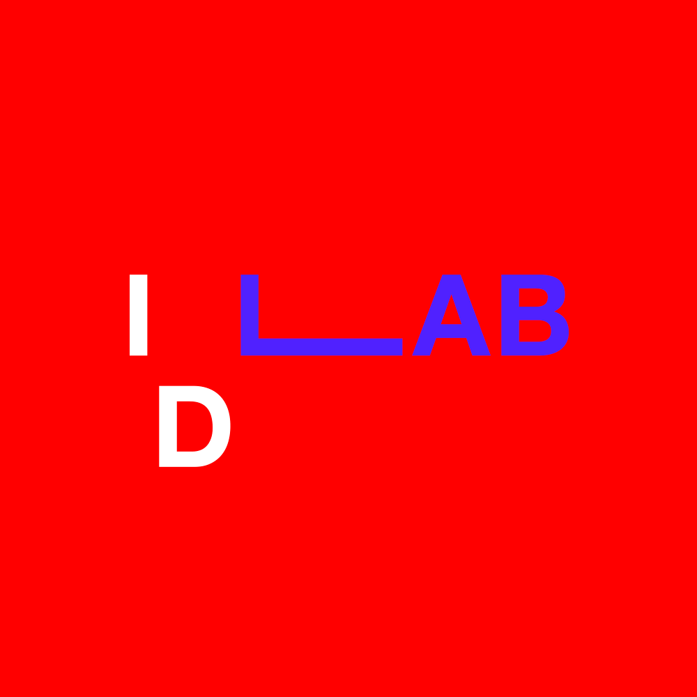 A palavra laboratório está em um fundo vermelho com letras azuis.