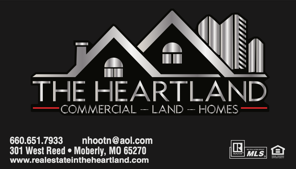 The heartland commercial land homes logo on a black background