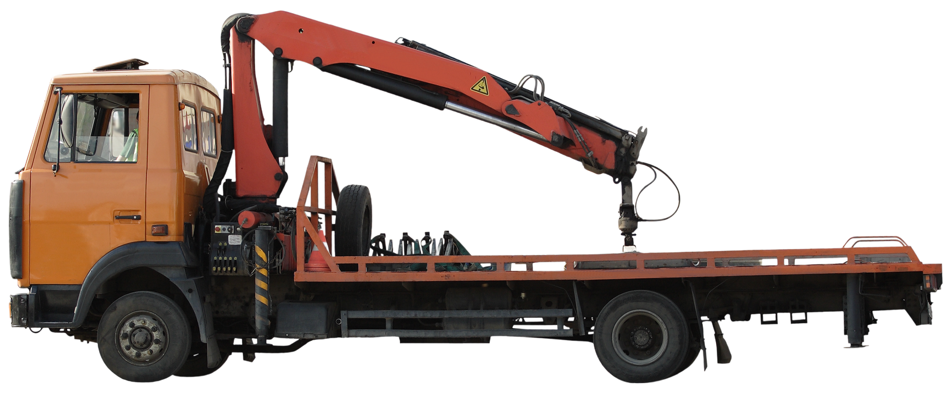 An orange tow truck with a crane attached to it