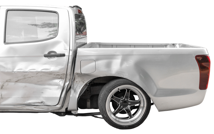 A silver truck with a damaged side is shown on a white background.
