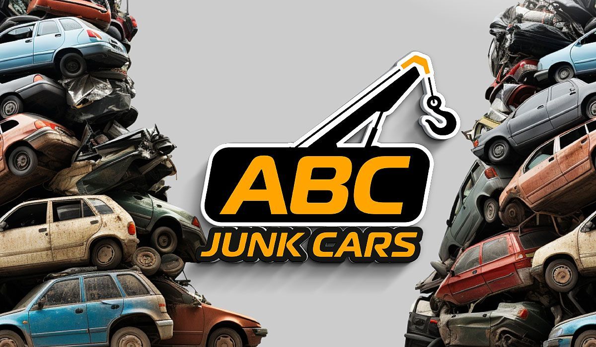 A pile of junk cars with the abc junk cars logo