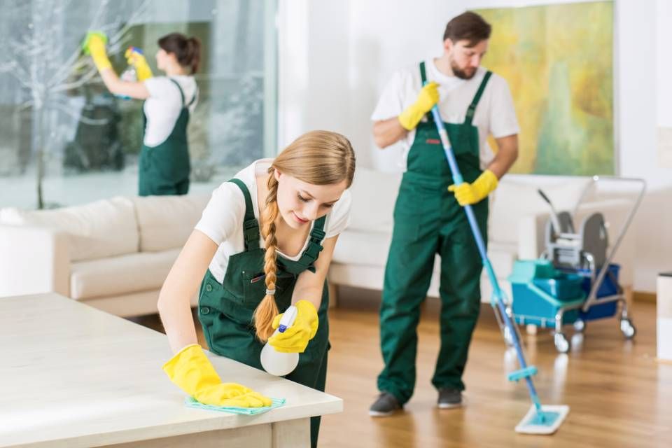workers cleaning the room