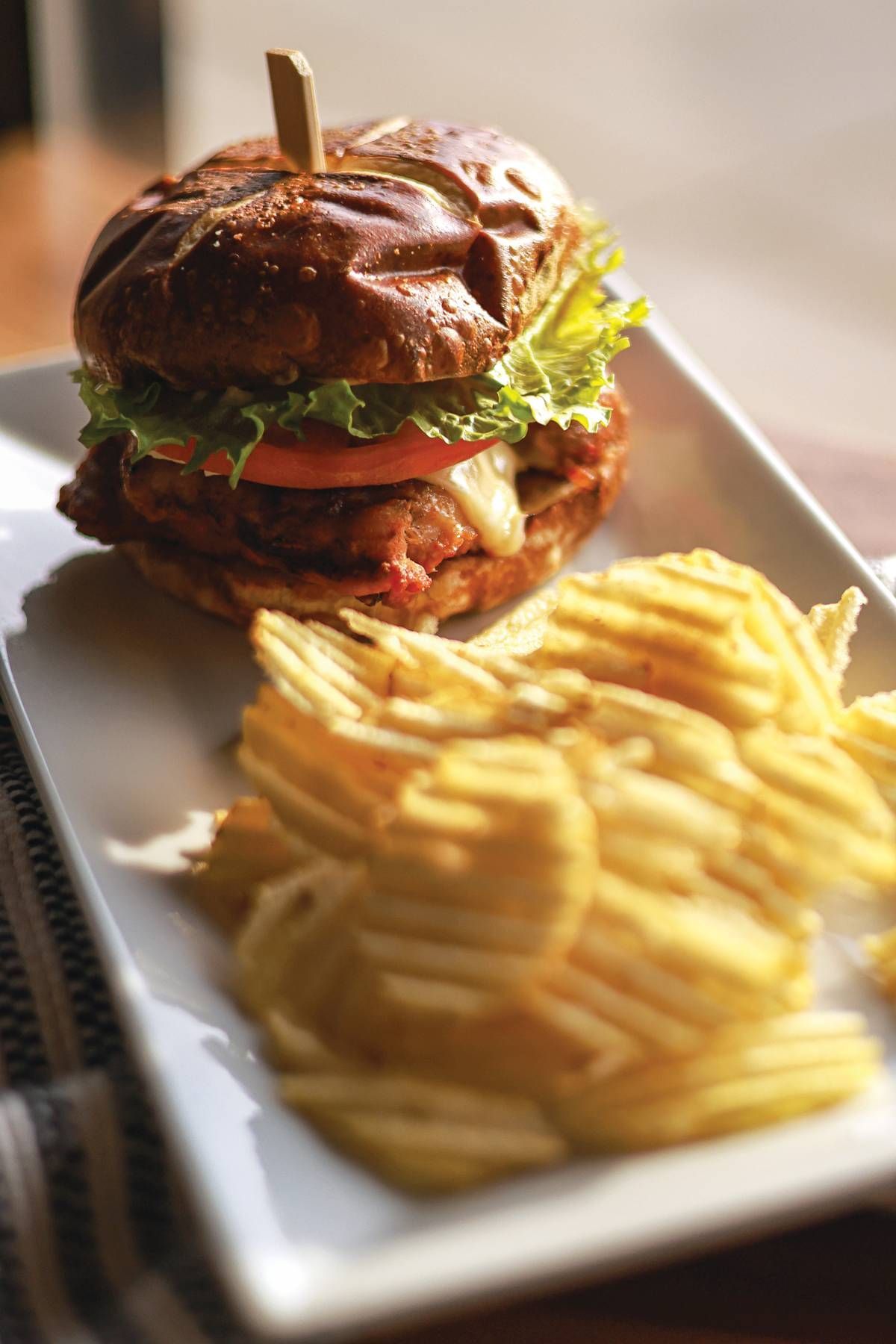 The Clay House BLT BBQ Chicken Pretzel Melt