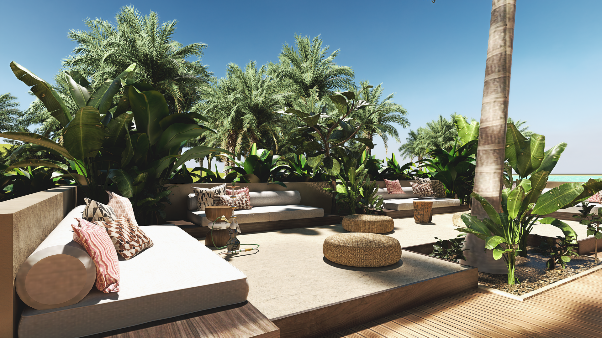 Outdoor lounge area with daybeds, cushions, and tropical plants under a blue sky.