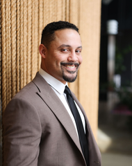 A house icon in a circle on a white background.