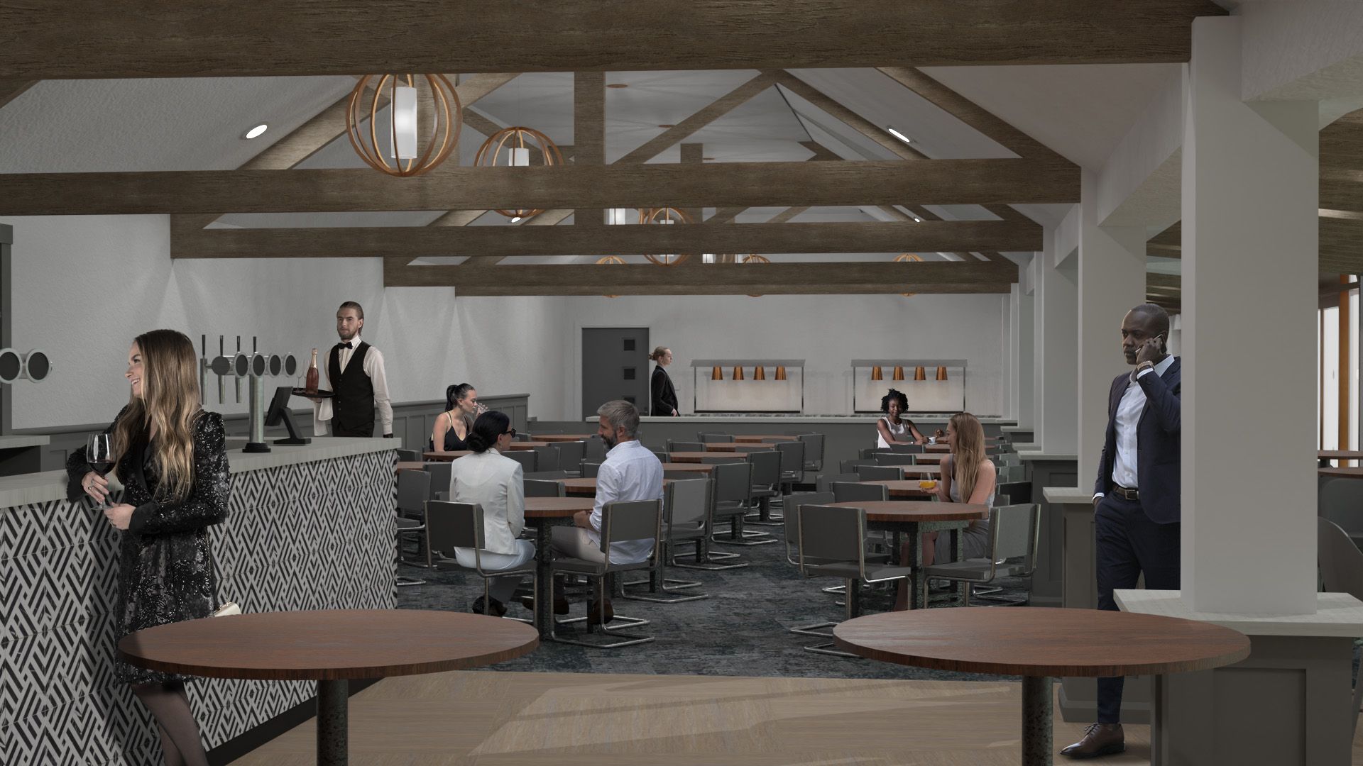 A group of people are sitting at tables in a restaurant.