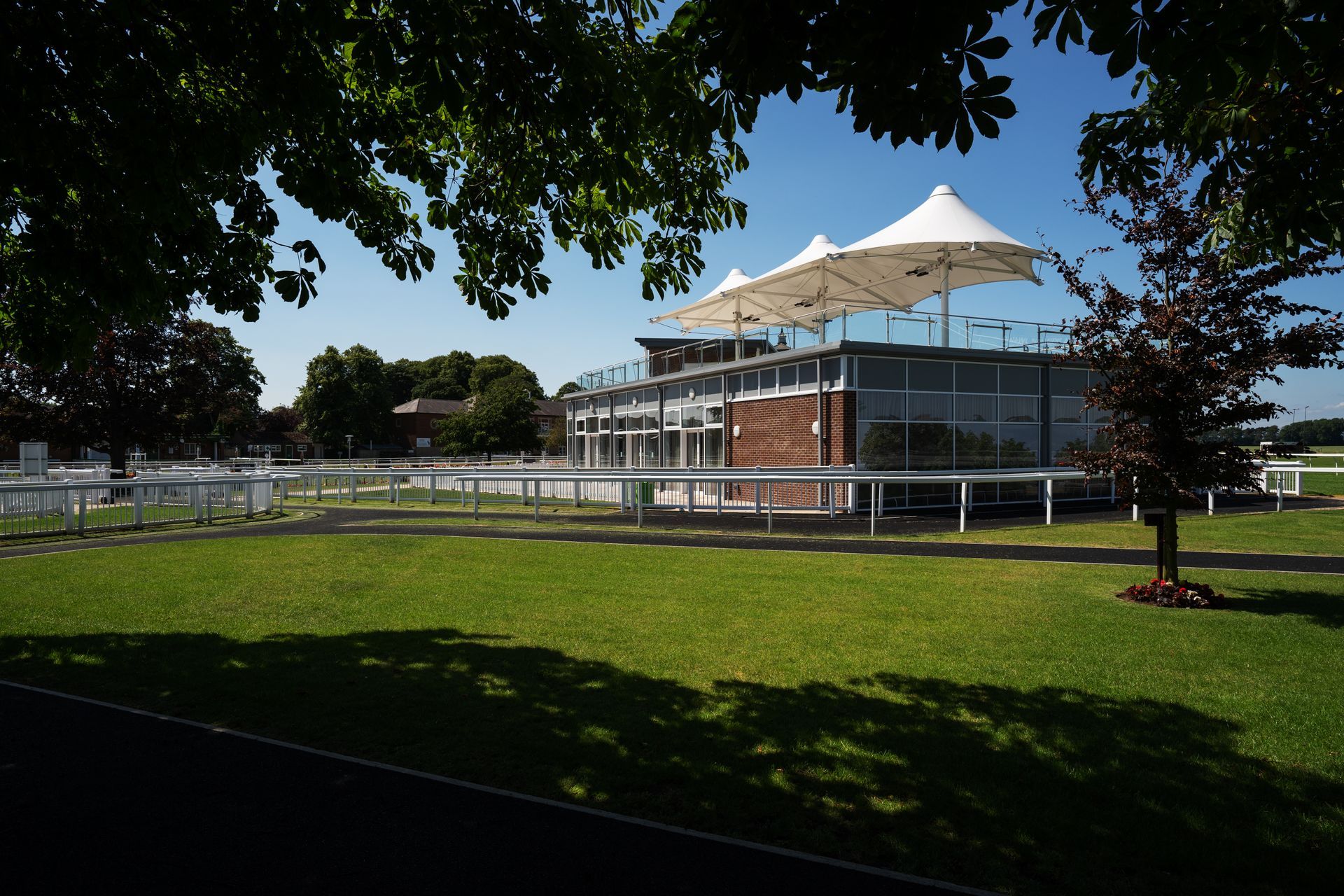 A building with a white umbrella on top of it