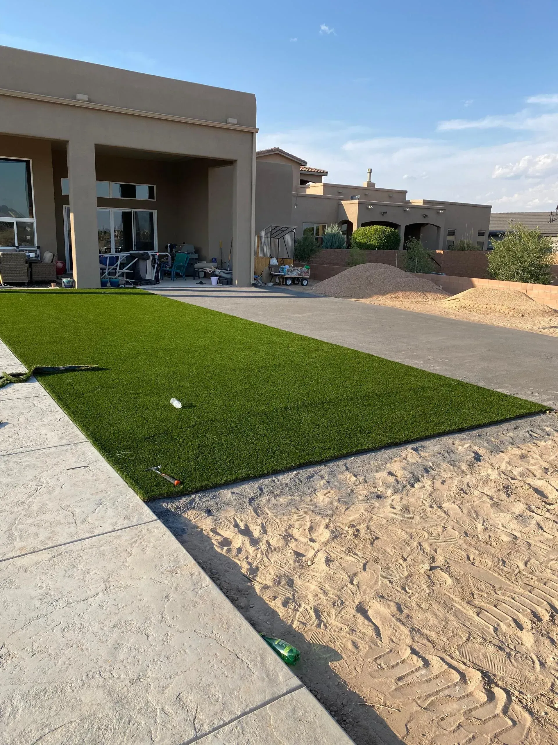 A house with a lot of grass in front of it