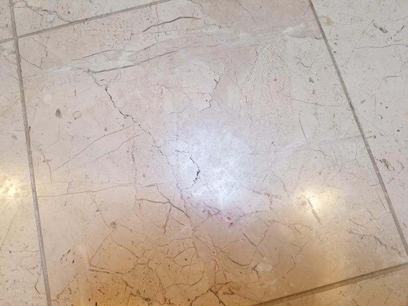 A kitchen with a sink and a window.