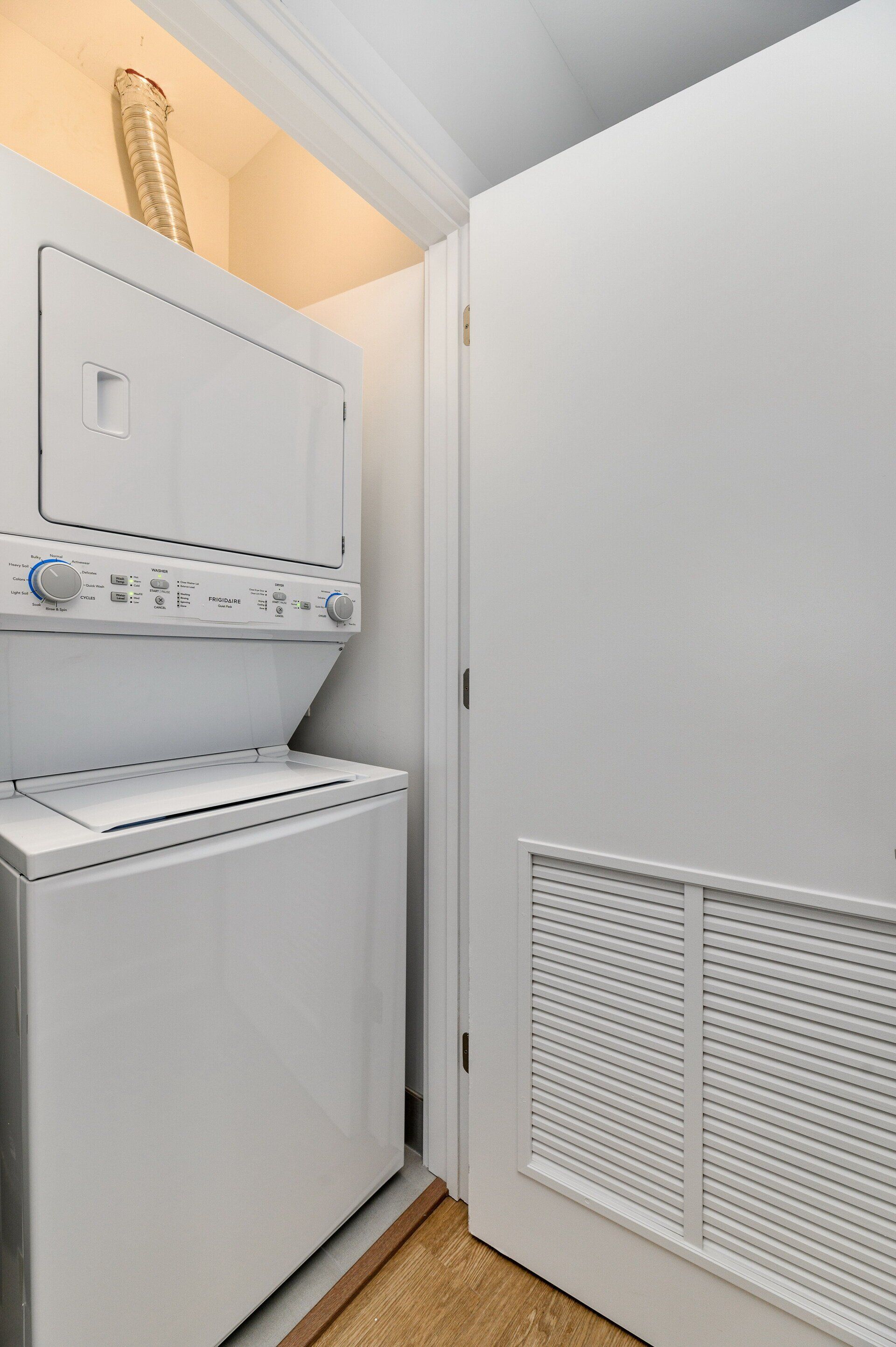 In-unit stacked washer and dryer