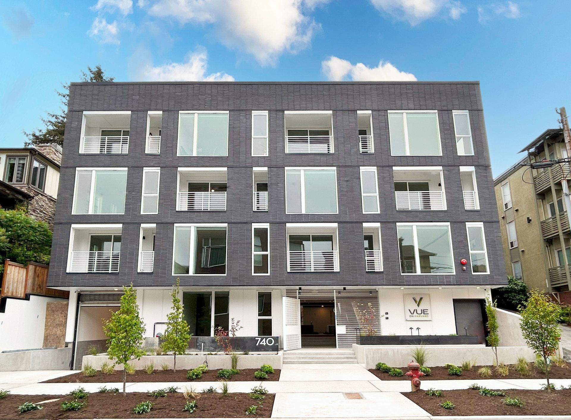 A large apartment building with a lot of windows