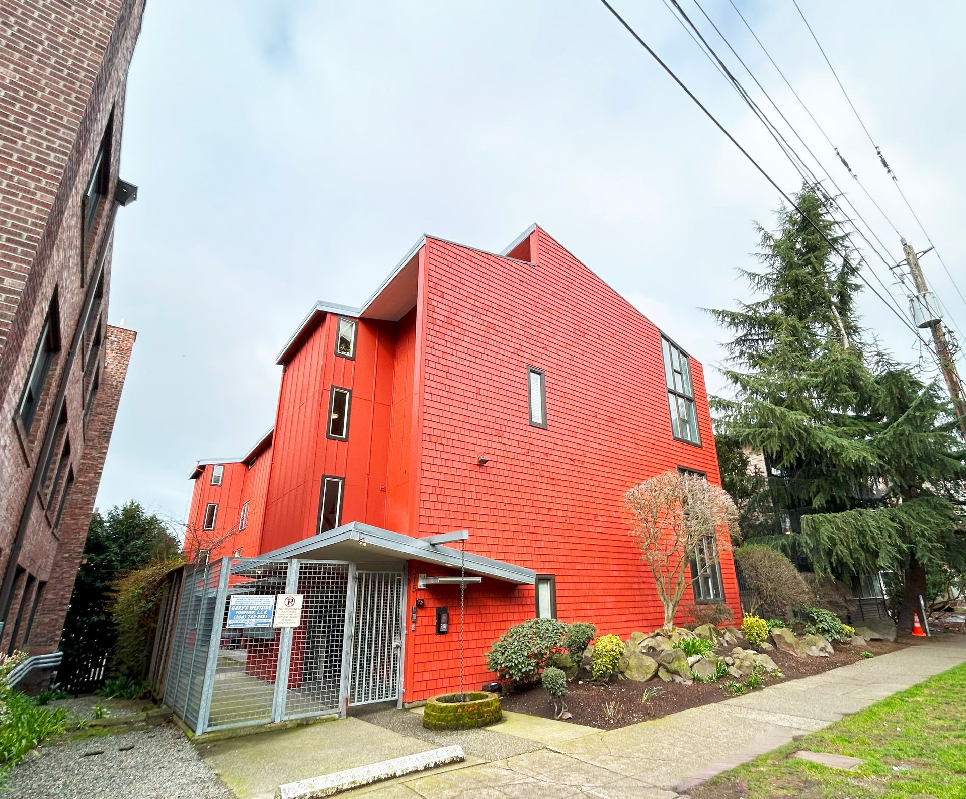A large red building with a staircase leading up to it