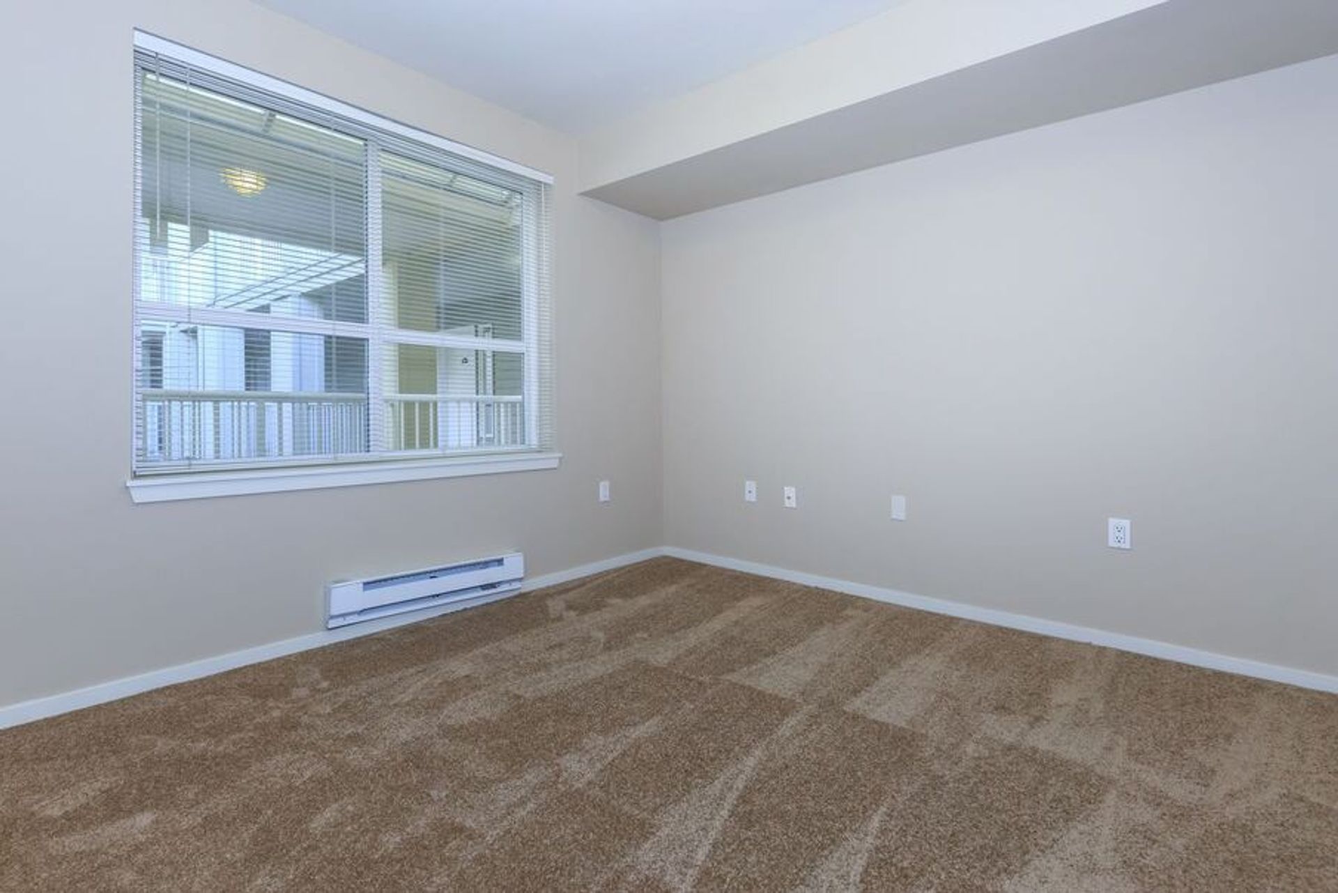 There is a large window in the middle of the room.