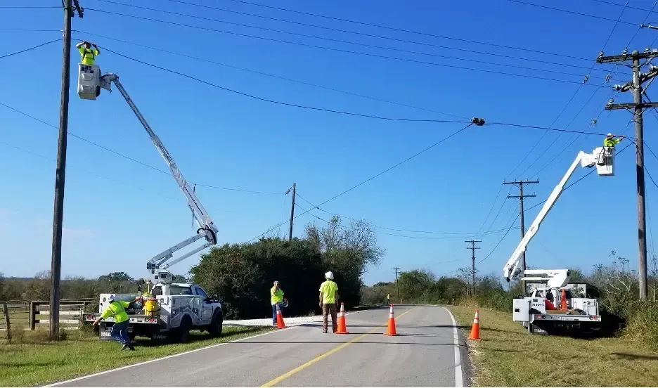 southern tier telecommunications, Telecommunications infrastructure, Network solutions, Communication services, Underground construction, Aerial construction, Aerial construction workers installing communication infrastructure on a tower