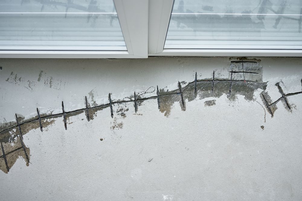 Repairing Cracks In Concrete Floor Near Window — Bananacoast Waterproofing in Yamba, NSW