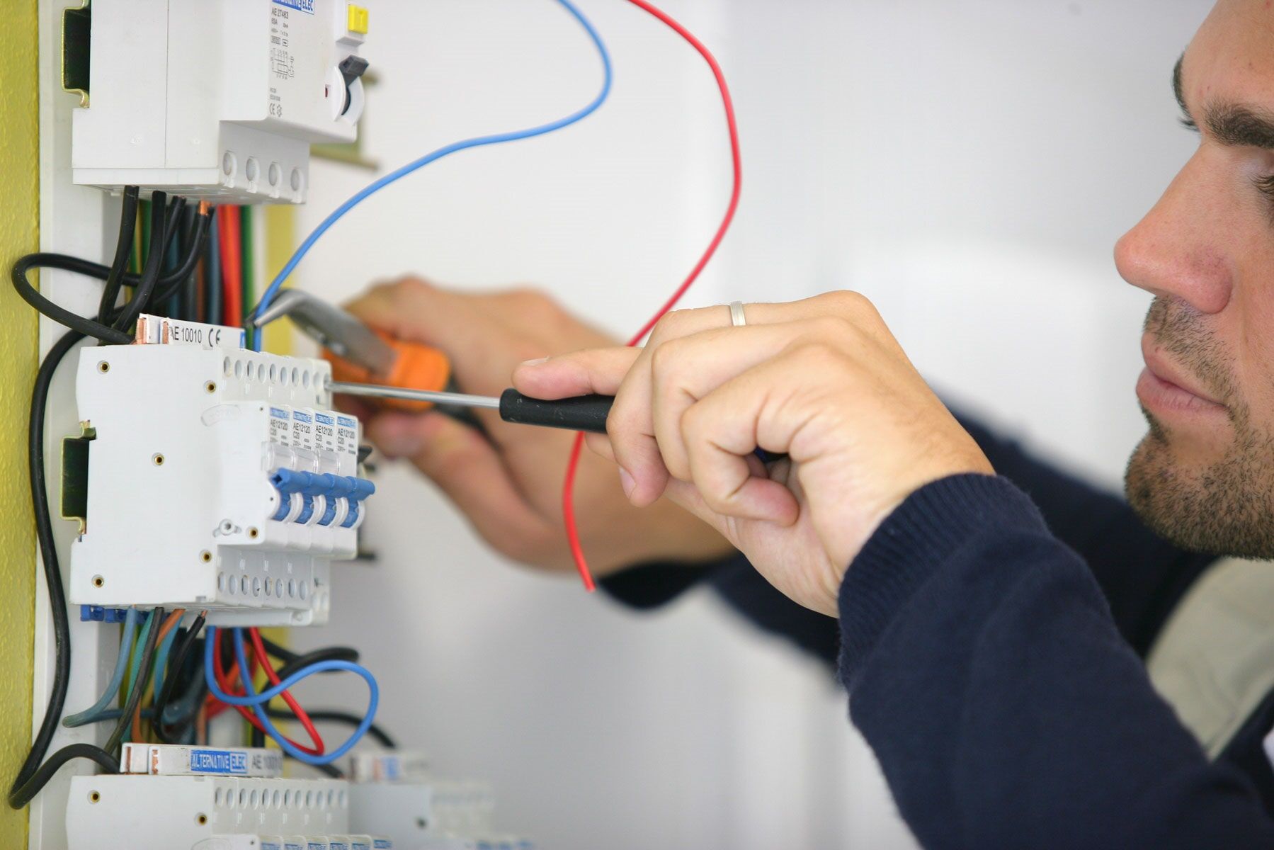 Electrician Fixing The Electricity Board — Trusted Electricians in Nowra, NSW