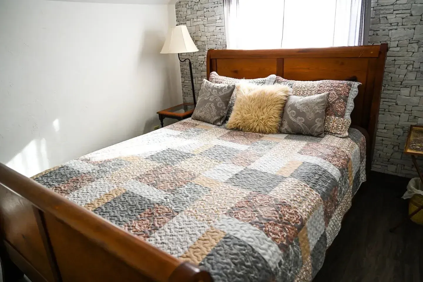 bed with rustic quilt