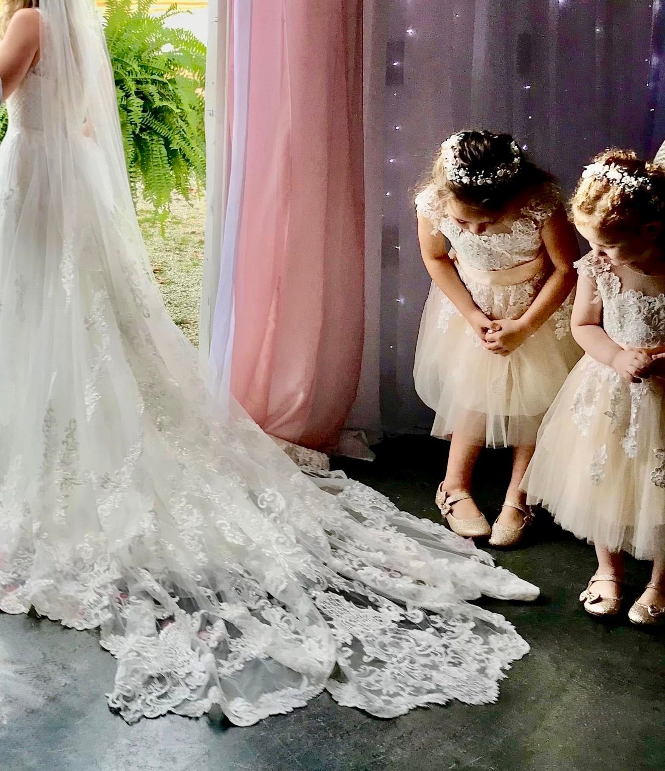 bride with flower girls