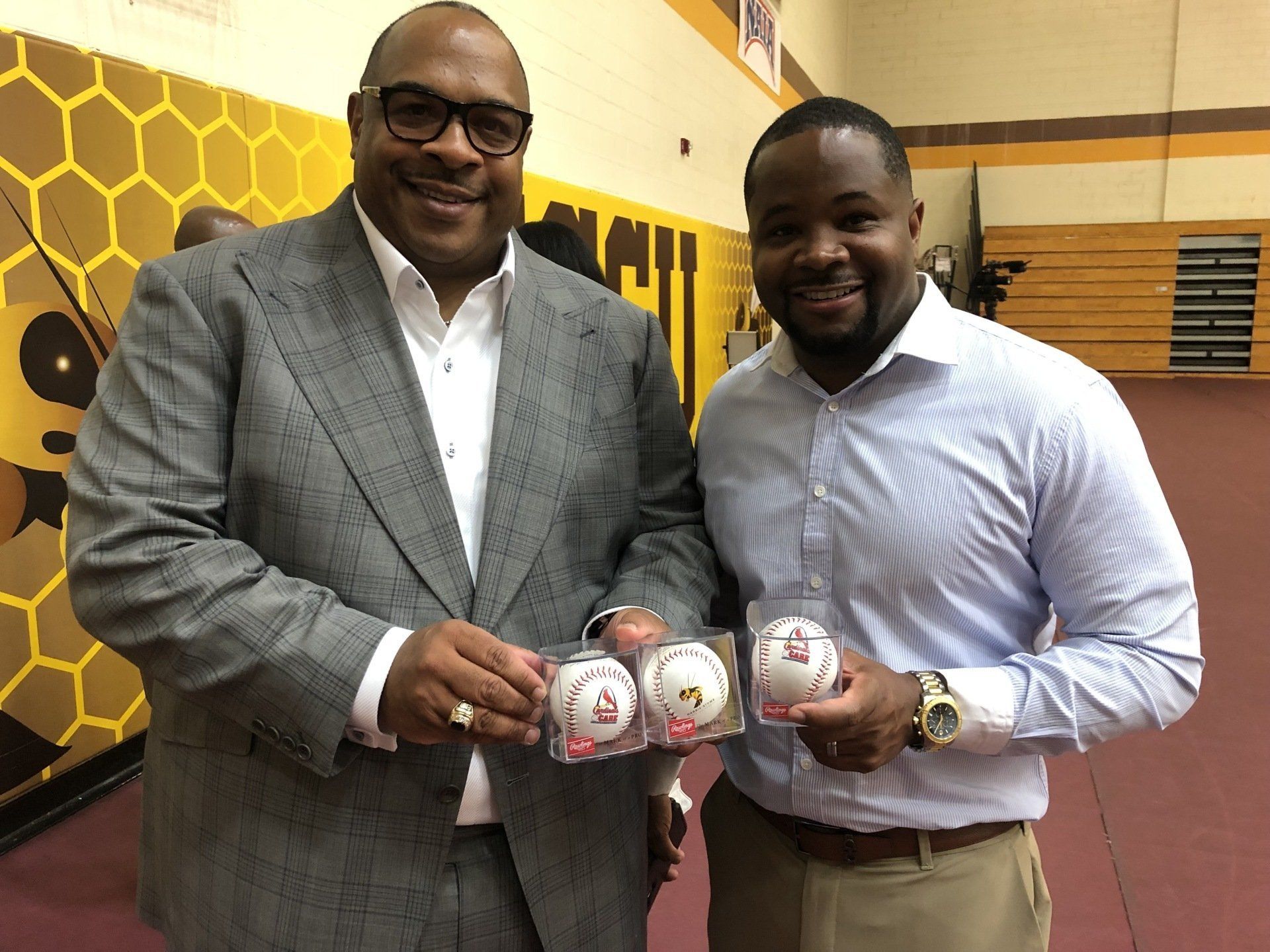 Rickey Whittington Holding Baseballs