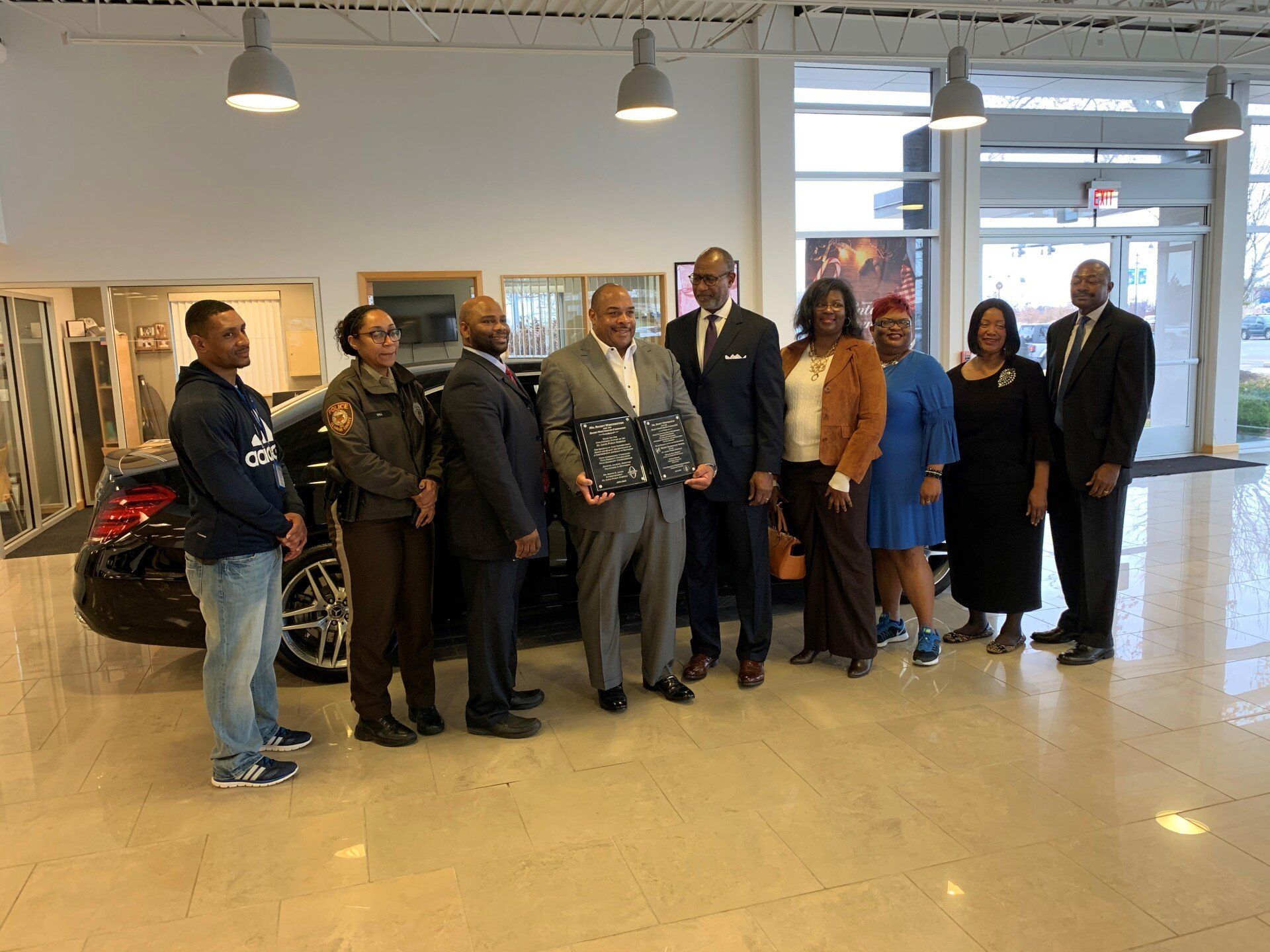 Rickey Whittington With His Team