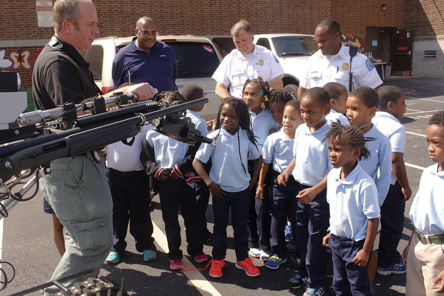 Kids Looking at a Robot