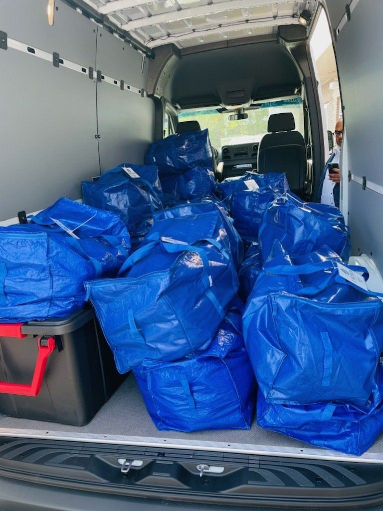 Care Packages in Blue Bags